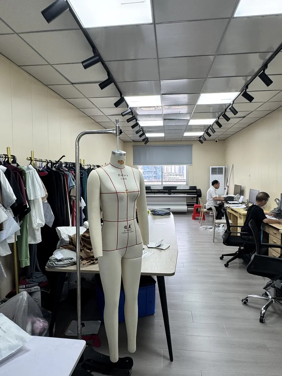 ZIESHINE sample room with dress form and fit samples
