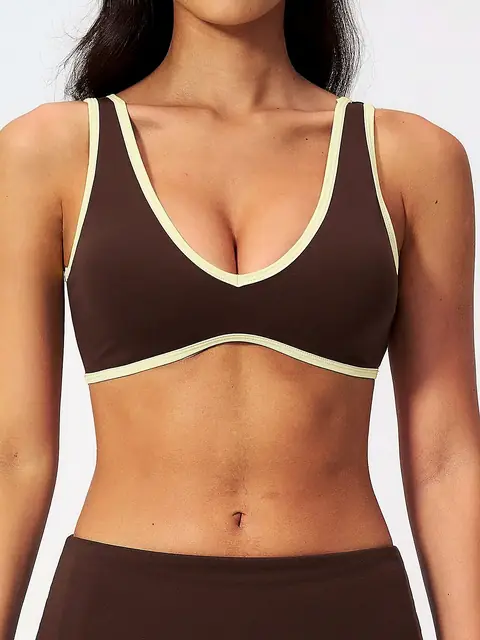 Colour-Block Open-Back sports bra in warm auburn front view