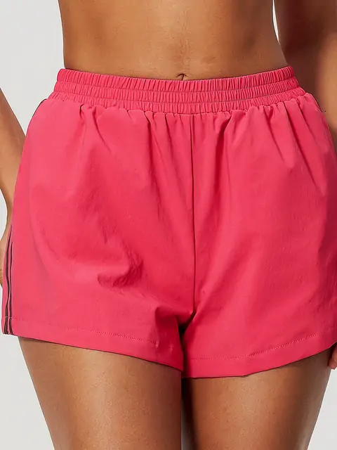 Contrast-Stripe Quick-Dry Run Shorts in Cherry Red — front view