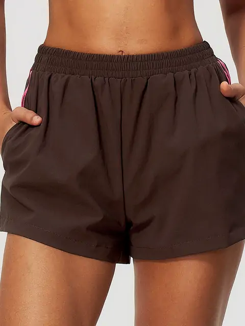 Contrast-Stripe Quick-Dry Run Shorts in Dark Chocolate — front view