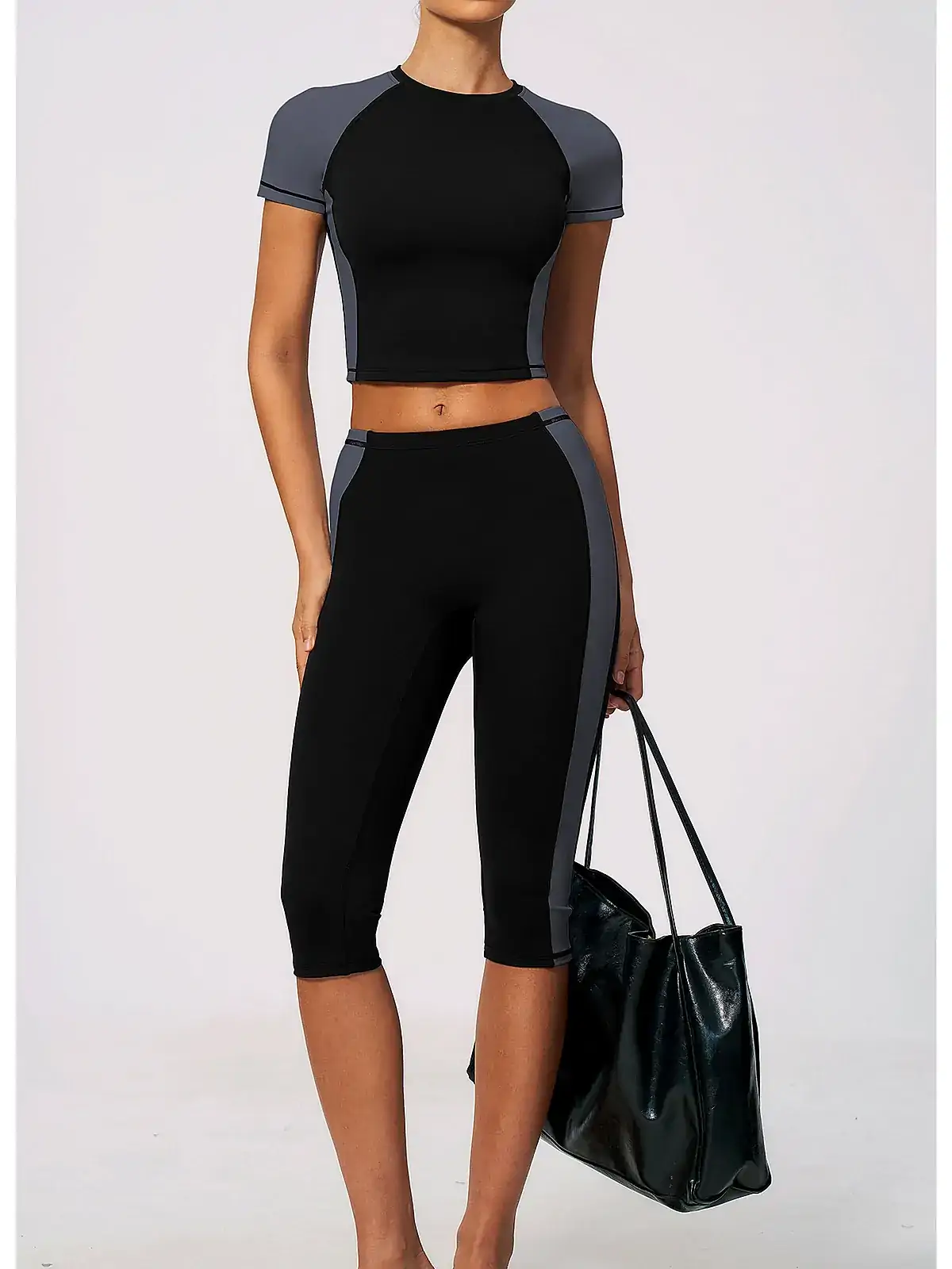 Fit detail on Crop Peach-Lift capri yoga set
