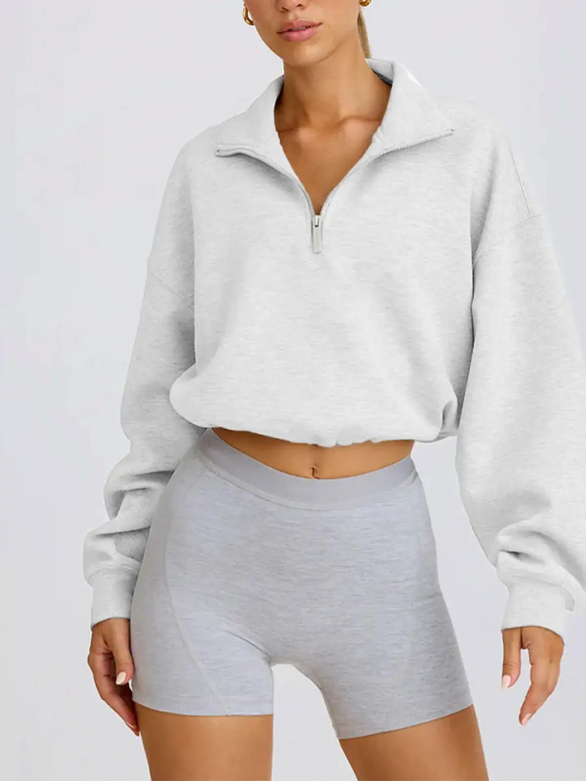 Waistband detail on Half-Zip Stand-Collar lounge sweatshirt