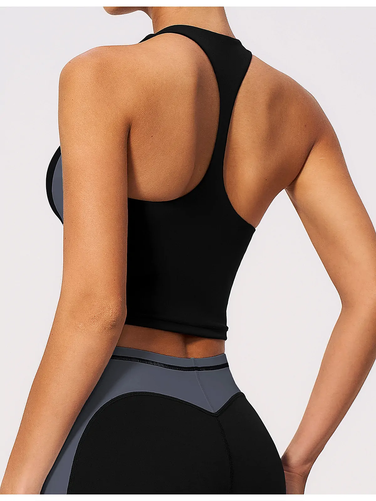 Waistband detail on Second-skin Colour-Block sports bra