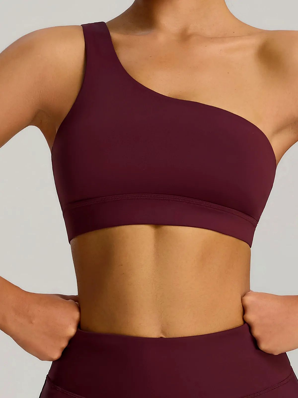 Waistband detail on One-Shoulder shock yoga tank