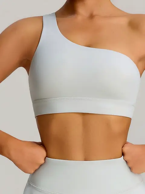 One-Shoulder shock yoga tank in cream apricot front view