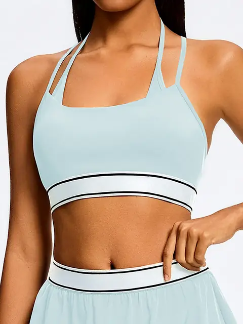 Padded Cross-Back yoga tank in cream apricot front view