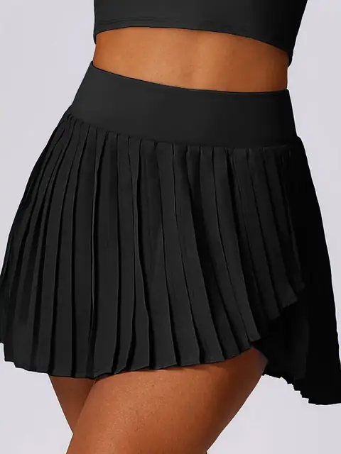 Pleated Quick-Dry skort in premium black front view