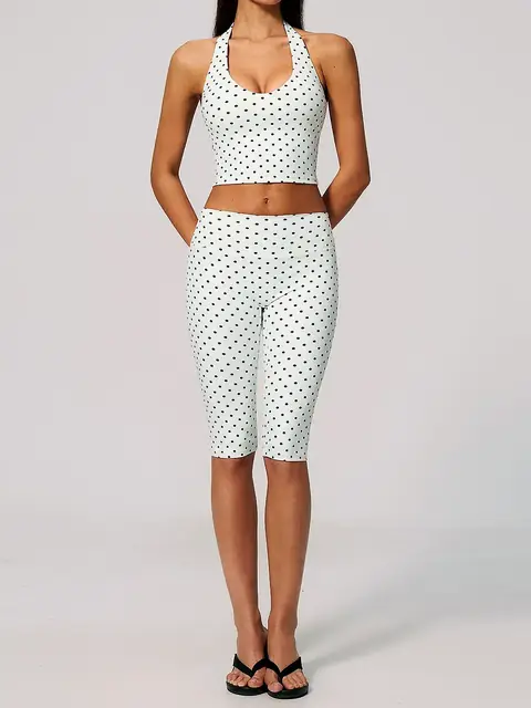 Polka dot Deep-V swim short set in white black dot front view