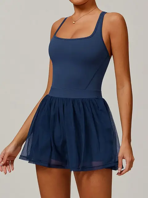 Recycled mesh tennis dress in dusk blue front view