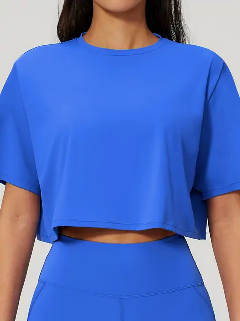 Relaxed Crop Crew Yoga Tee front view in emblem blue