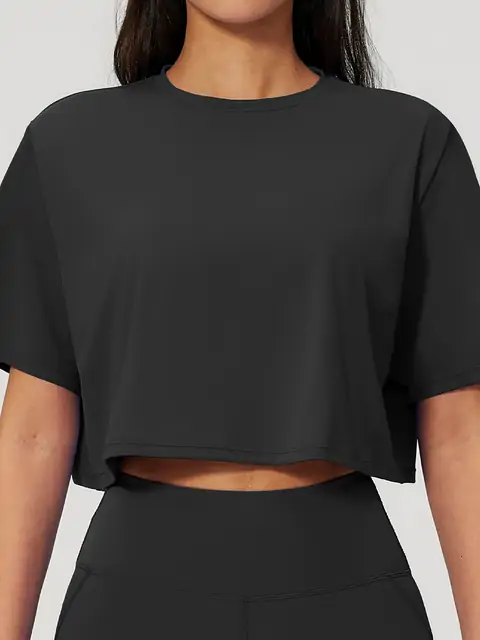 Relaxed Crop Crew Yoga Tee front view in premium black