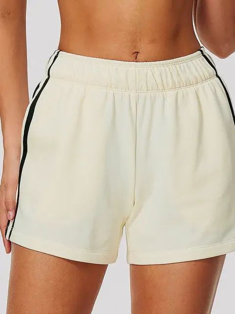 Contrast-Stripe Fleece Training Shorts in Oat Apricot — front view